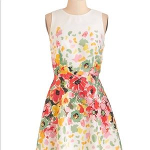 Flowered, white, sleeveless dress.